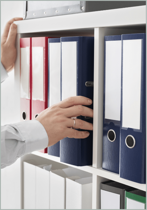 Organized legal document binders in a storage facility
