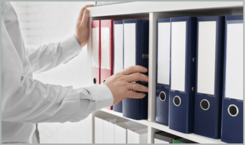 Organized legal document binders in a storage facility