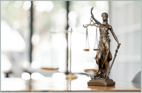 Statue of Lady Justice holding scales